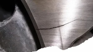 Cold shut casting defect showing a weak seam where two molten metal streams failed to fuse