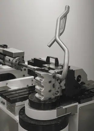 CNC pipe bending machine performing precision metal tube bending process